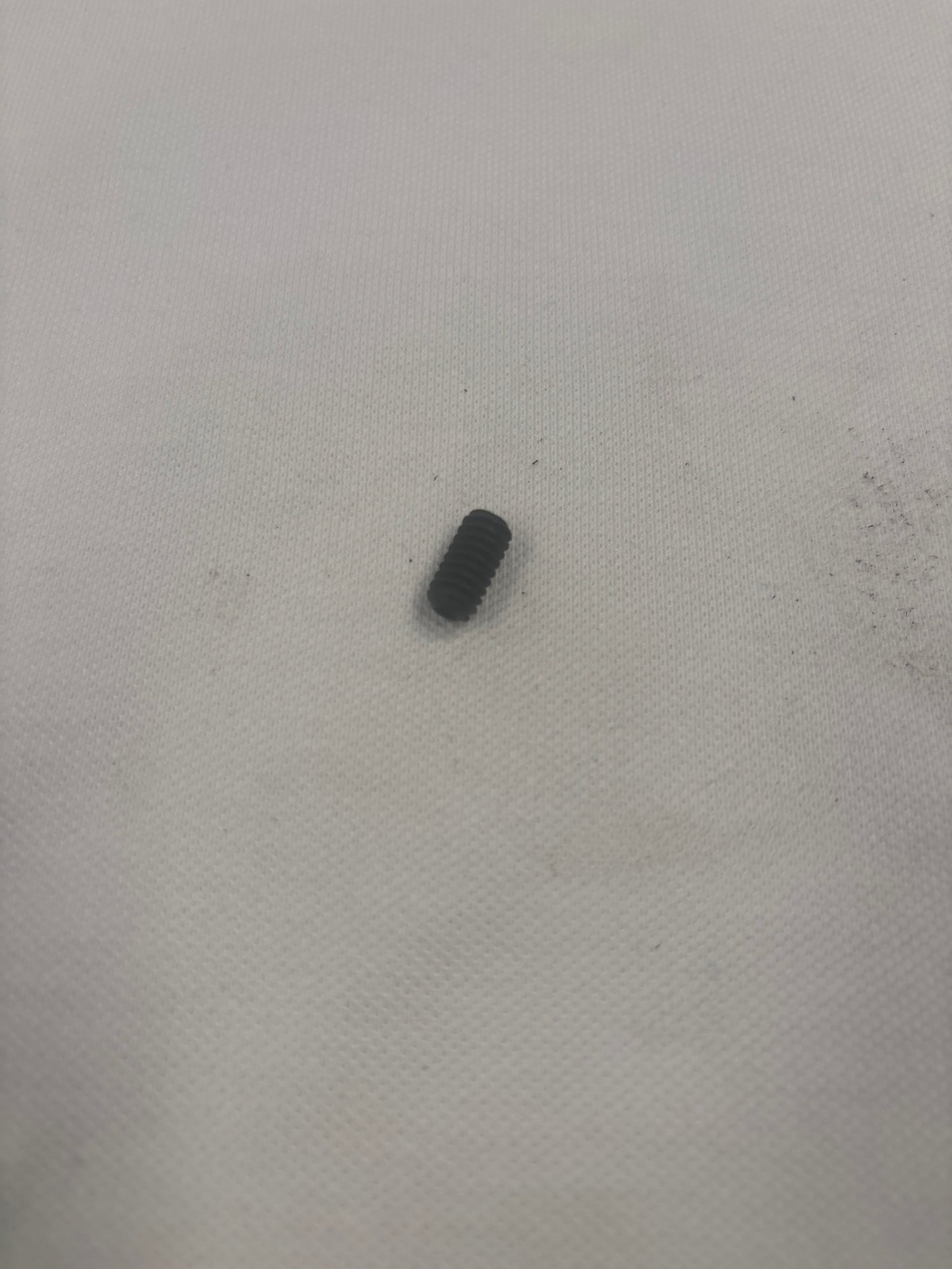 Tornillo de retención